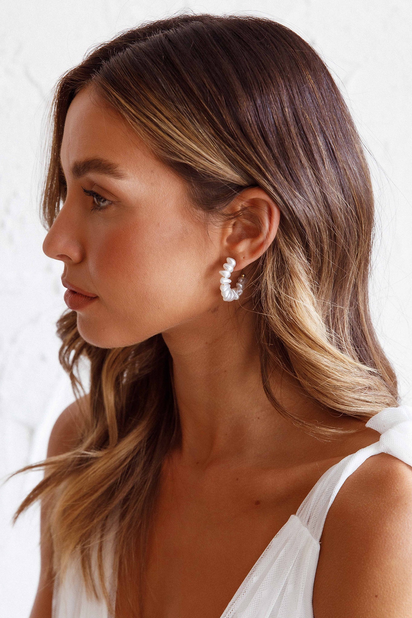 Boucles d'oreilles créoles en perles dorées