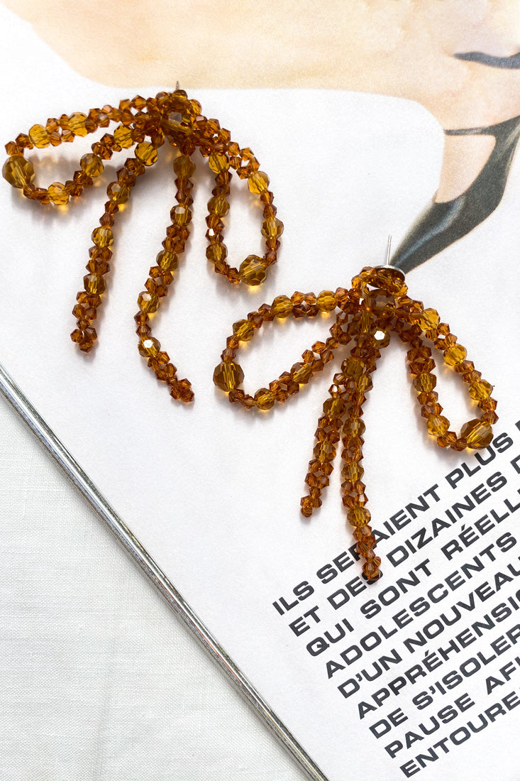 Boucles d'oreilles à nœud perlé Flora Tan