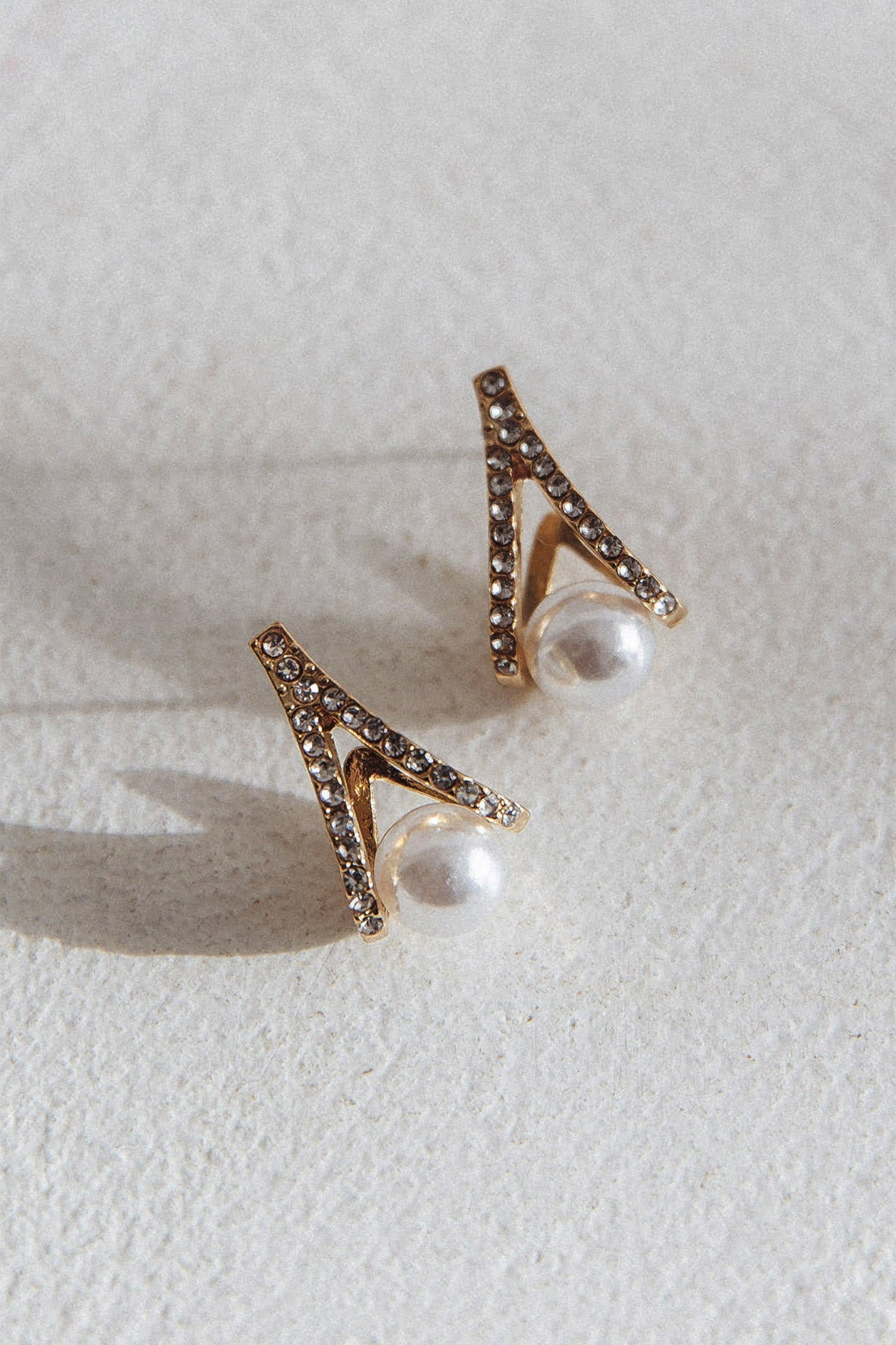 Boucles d'oreilles à clou en zircon perlé dorées