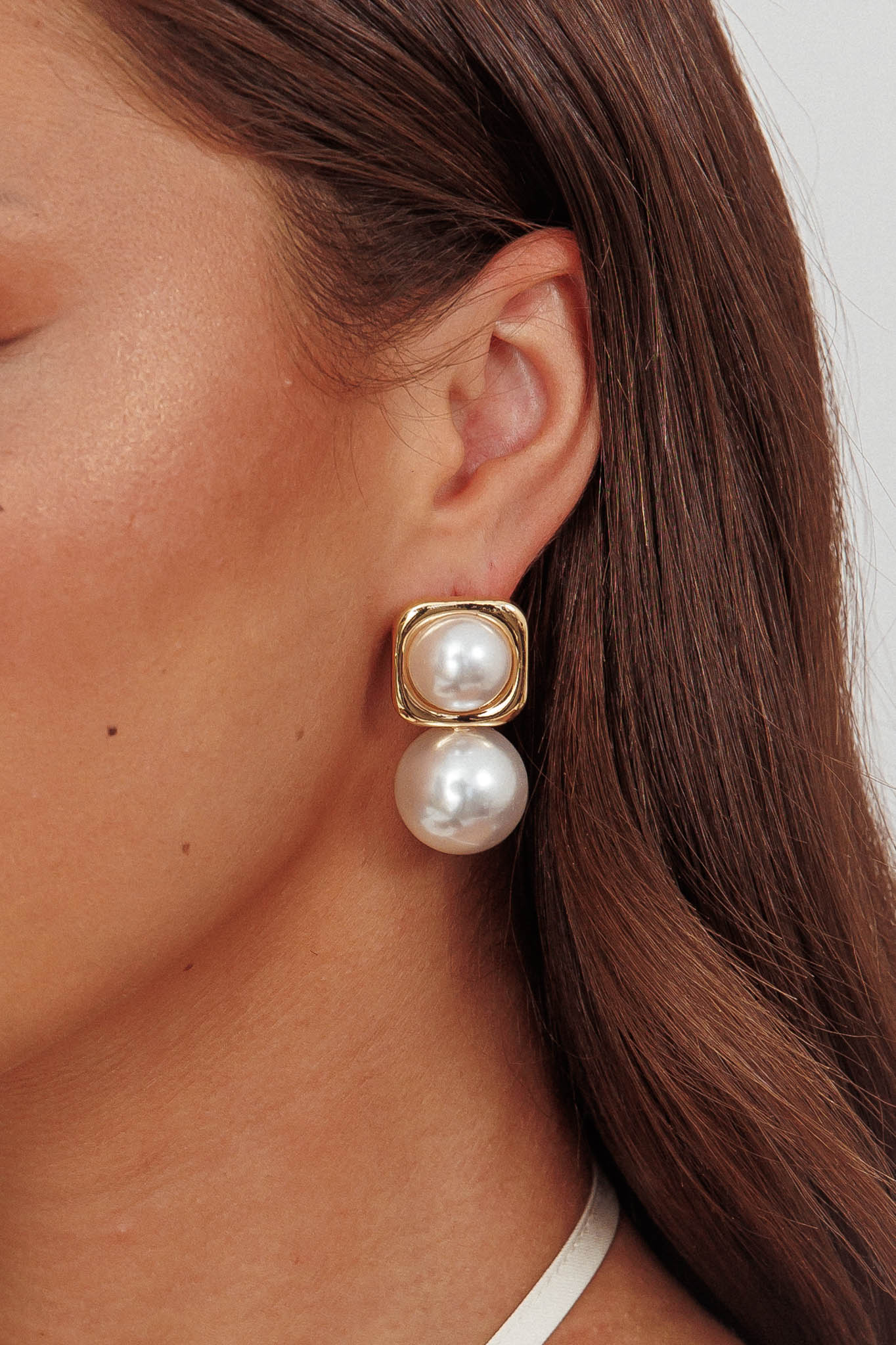 Boucles d'oreilles Clara en perles carrées dorées